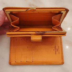 USED Louis Vuitton (Orange) card and coin wallet.